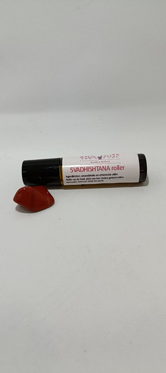 Heilig been chakra roller met bijhorende steen