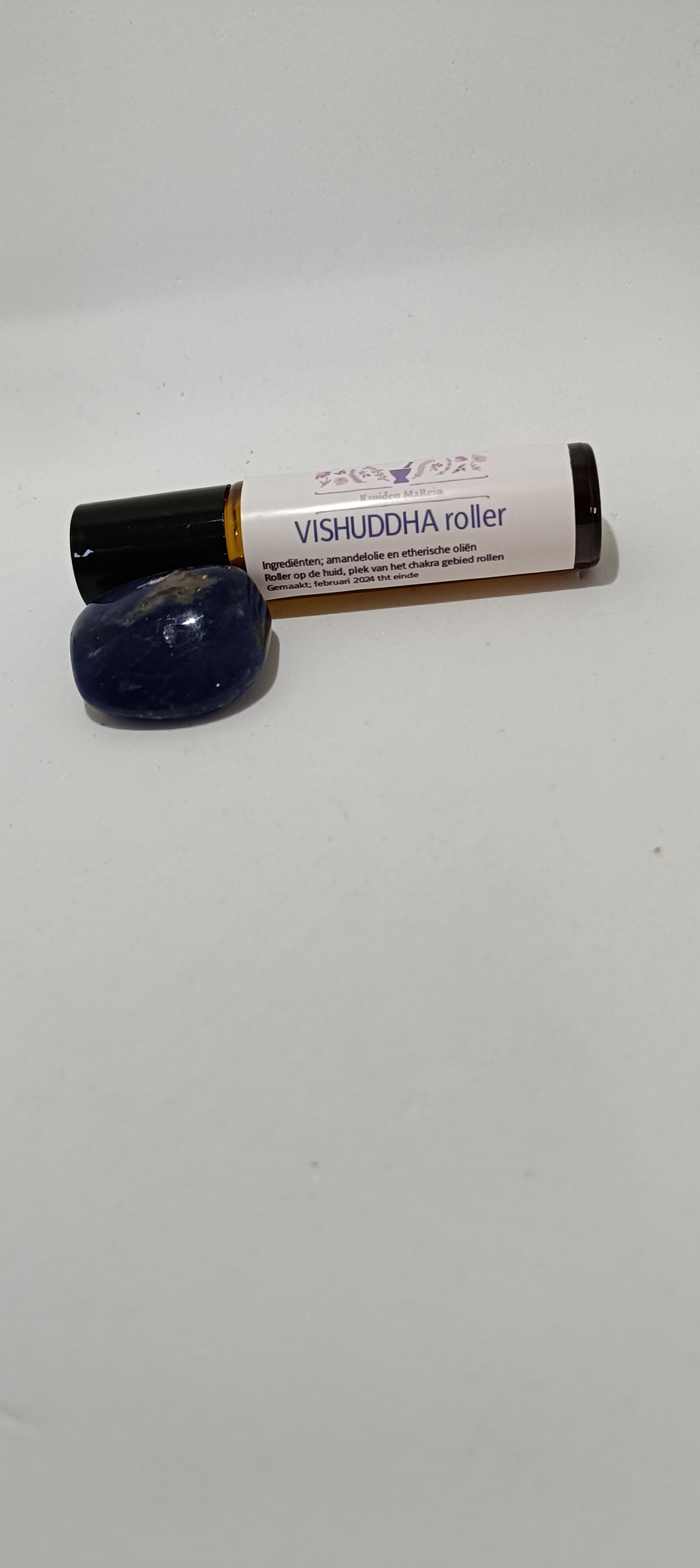 Keel chakra roller met bijhorende steen